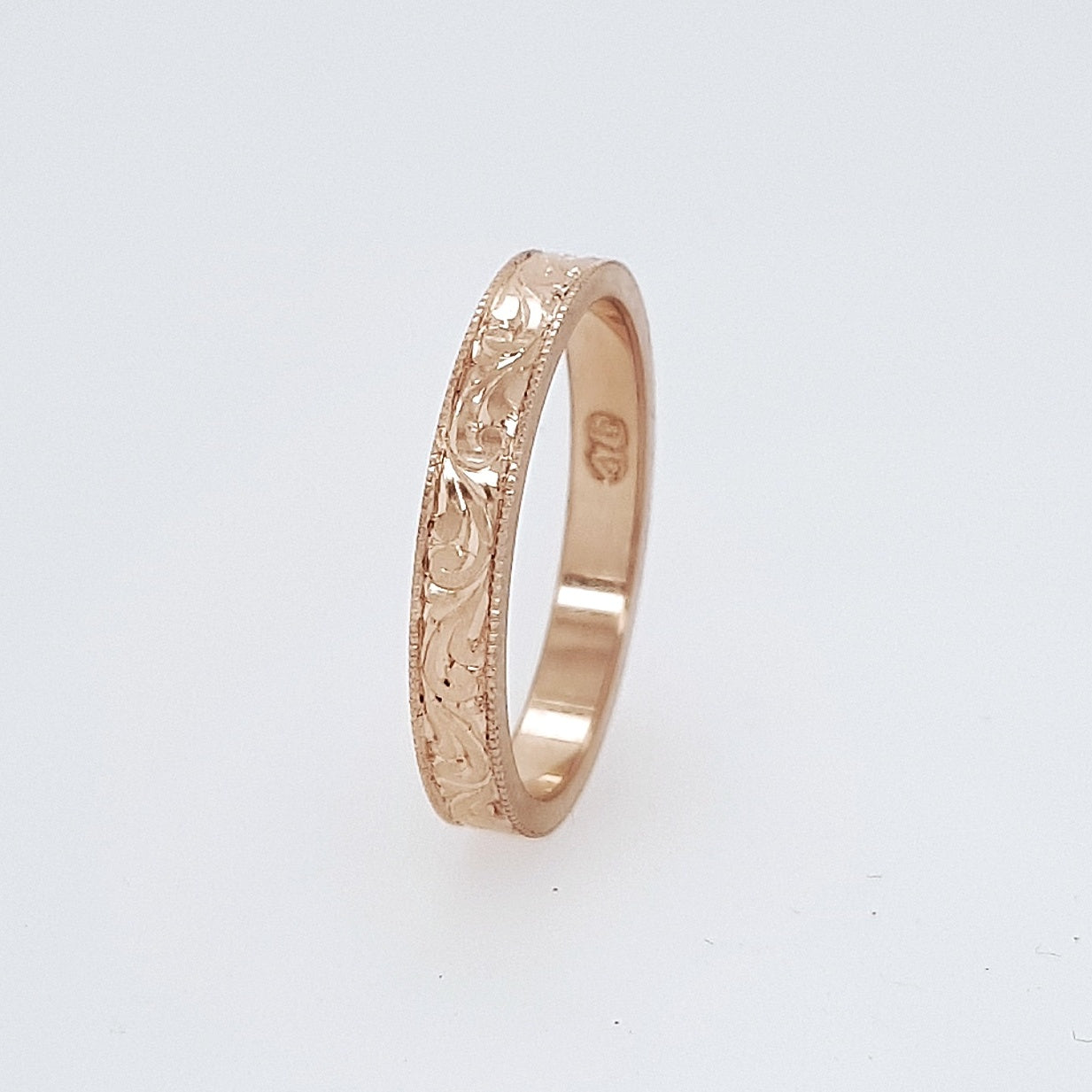 Scroll engraved ring