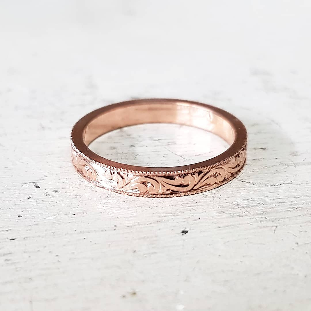 Scroll engraved ring