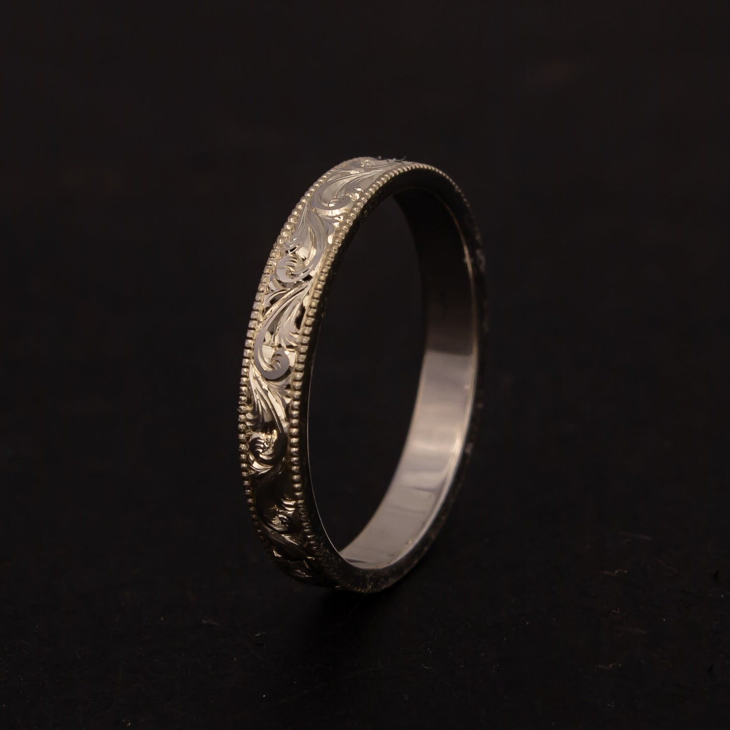 Scroll engraved ring