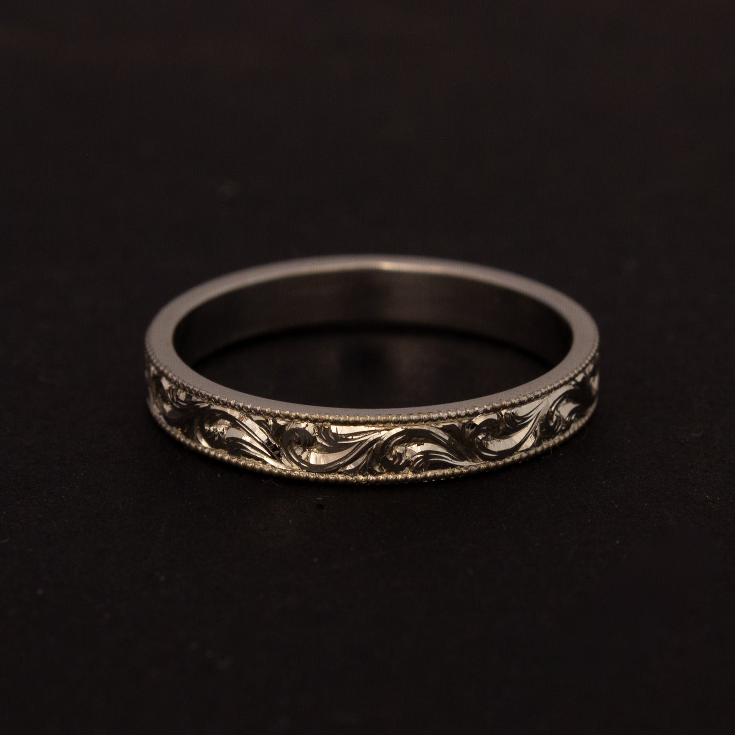 Scroll engraved ring