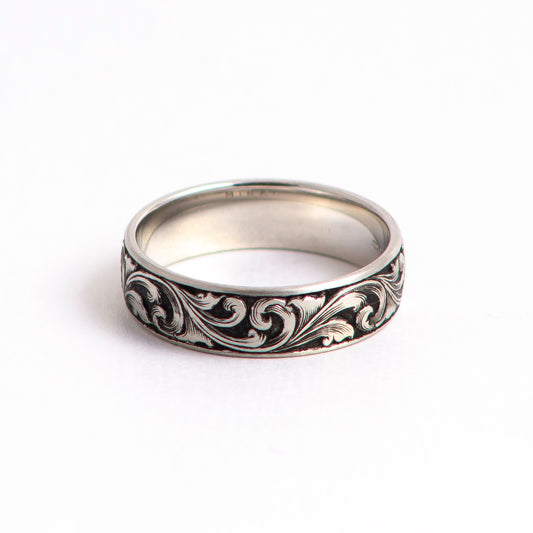 Hand Engraved Platinum Ring with deep relief scrollwork